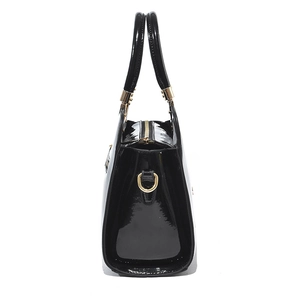 Glossy black patent leather tote bag with gold hardware and top zipper closure