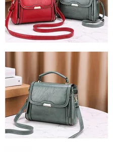 Détail de sacs à main en cuir grainé rouge et vert avec boucles en métal doré