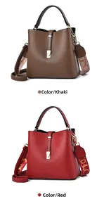 Detail view of khaki and red leather bucket bags with wide logo fabric shoulder straps