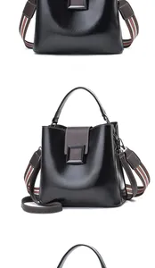 Front and side view of black bucket bag with square buckle and striped strap