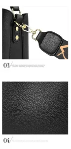 Detail of black lychee grain leather bag with gold hardware and woven strap