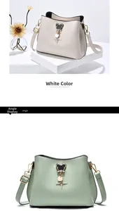Detailed view of bucket bags with Mickey metal buckle and gold adjustable hardware