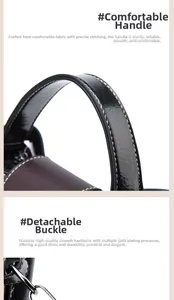 Detail of leather handle with precision stitching and silver-tone metal lobster clasp