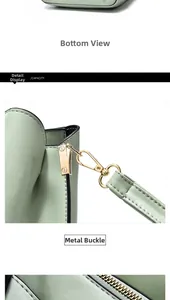 Detail view of mint green bucket bag with lychee texture leather and gold hardware