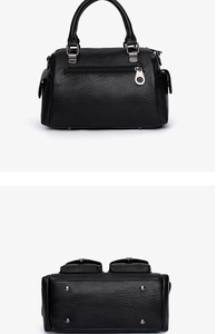 Detailed back and bottom views of a black soft leather handbag showing metal feet