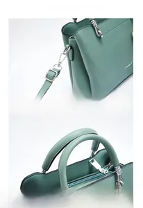 Detail view of light green PU leather handbag with silver hardware and logo branding