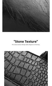 Detailed macro view of the black stone pattern texture and fine stitching on the faux leather bag
