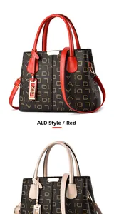 Detail view of large tote bags with letter patterns in red and beige color options
