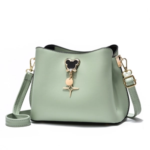 Mint green PU leather bucket bag for women with gold charm and adjustable shoulder strap