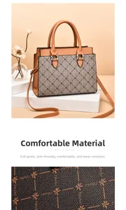 Detail showing the textured jacquard fabric and gold hardware of the handbag