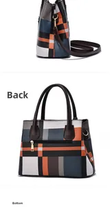Detail view of the geometric patterned tote bag with rear zipper pocket and flat bottom base