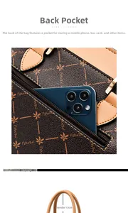Detail view of brown handbag showing functional back pocket and 13cm handle height