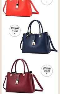 Close-up of litchi pattern leather handbags in vibrant red, blue, and wine colors