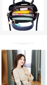 Detail of spacious three-layer interior of a navy pebbled leather handbag for daily items