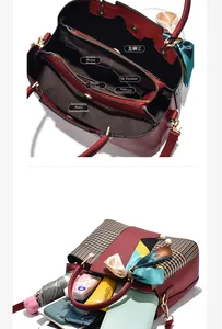Detailed interior view of a large tote with three main compartments and functional pockets