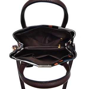Plaid tote bag interior view with multiple compartments and golden hardware detail