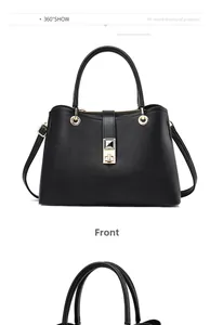 Detail view of black lychee leather handbag with golden lock and wave edge design