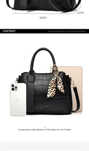 Detailed size chart for black embossed tote bag with leopard scarf and strap