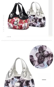 Detail of floral printed pleated tote bags showing texture and silver metal rings