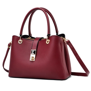 Chic burgundy lychee texture tote bag with golden hardware and detachable shoulder strap
