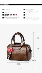Detail view of brown crocodile texture bag showing size dimensions 24x14x15cm and interior capacity