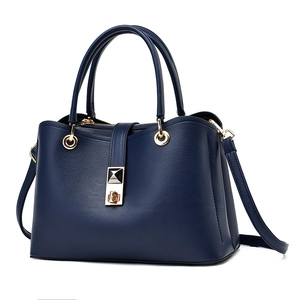 Classic dark blue lychee grain leather tote bag with gold hardware and dual handles