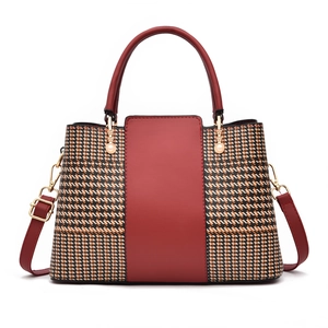 Fashionable dark red patchwork shoulder bag with houndstooth pattern and pearl details