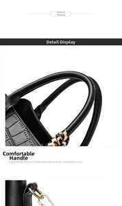 Detail view of the ergonomic top handle with elegant silk scarf wrap and metal hardware