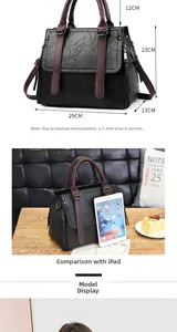 Detailed dimensions of black PU leather handbag showing 29cm length and 23cm height