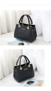 Detailed macro of black leather handbag with premium gold hardware and Guabanly logo