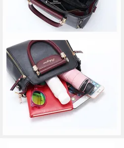 Detail view of large capacity interior for multi-color tote bag with multiple compartments