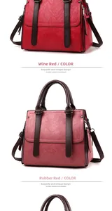 Detail of burgundy and dusty pink textured leather handbags with metallic accents