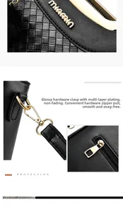 Détail du sac en cuir noir texturé avec ferrures dorées et fermeture éclair fluide
