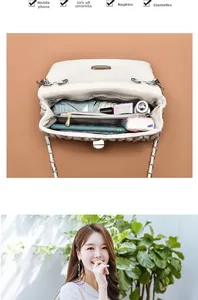 Detail view of cream quilted bag interior compartments showing daily storage capacity