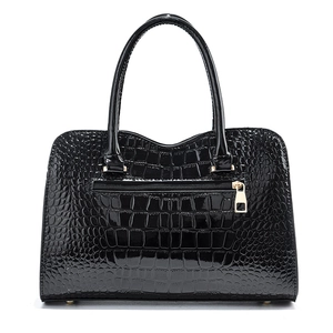 Glossy black crocodile pattern handbag with spacious interior and gold zippers