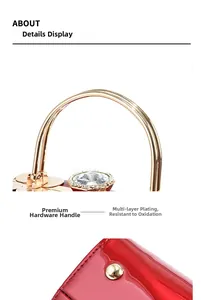 Close-up of red patent leather bag with gold multi-layer plated metal handle and crystal