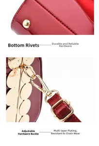 Detail of red patent leather bag showing gold bottom rivets and adjustable strap buckle