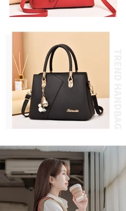 Detail of lychee pattern leather handbag with gold hardware and tassel charm