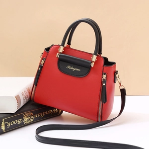 Contrast color large capacity tote bag in red and black leather with gold hardware