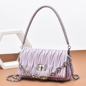 Elegant lavender pleated leather handbag with diamond-encrusted lock and chain strap