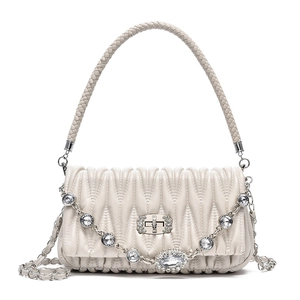 Elegant cream pleated handbag with crystal-embellished chain and woven top handle