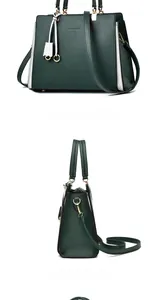 Detail view of dark green pebbled leather handbag with side contrast and gold hardware