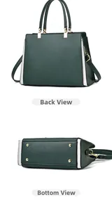 Detail view of handbag base with metal feet and smooth back panel in green and white