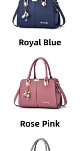 Detail view of royal blue and rubber pink pebbled leather handbags with floral charms