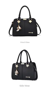 Detailed views of a black faux leather handbag with golden hardware and floral charm