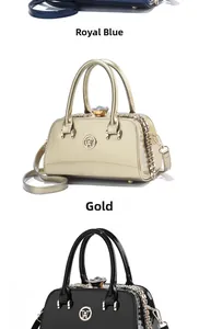 Close-up of gloss patent leather mini bags with crystal clasps and gold W logos