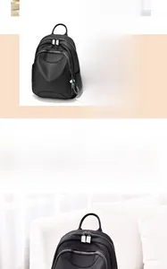 Sac à dos noir polyvalent avec finition brillante, trois modes de port et zips argentés