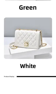 Detail of white quilted chain bag with gold floral clasp on a geometric display