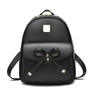 Sac à dos tendance en cuir PU noir pour femmes avec nœud et plaque en métal doré