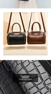 Macro detail of high-quality stone pattern texture on black and brown Boston bags